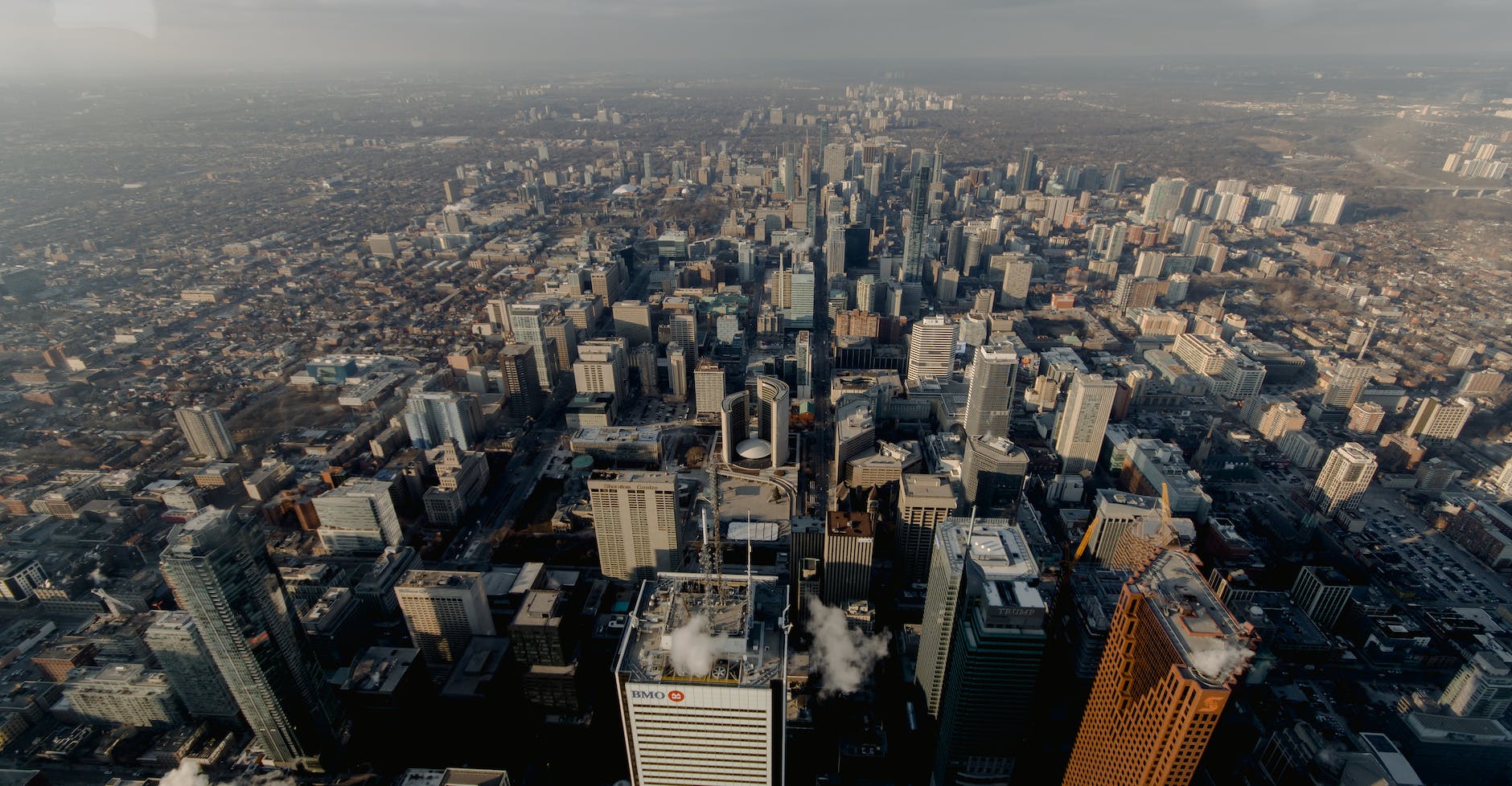 streets of modern city with tall skyscrapers